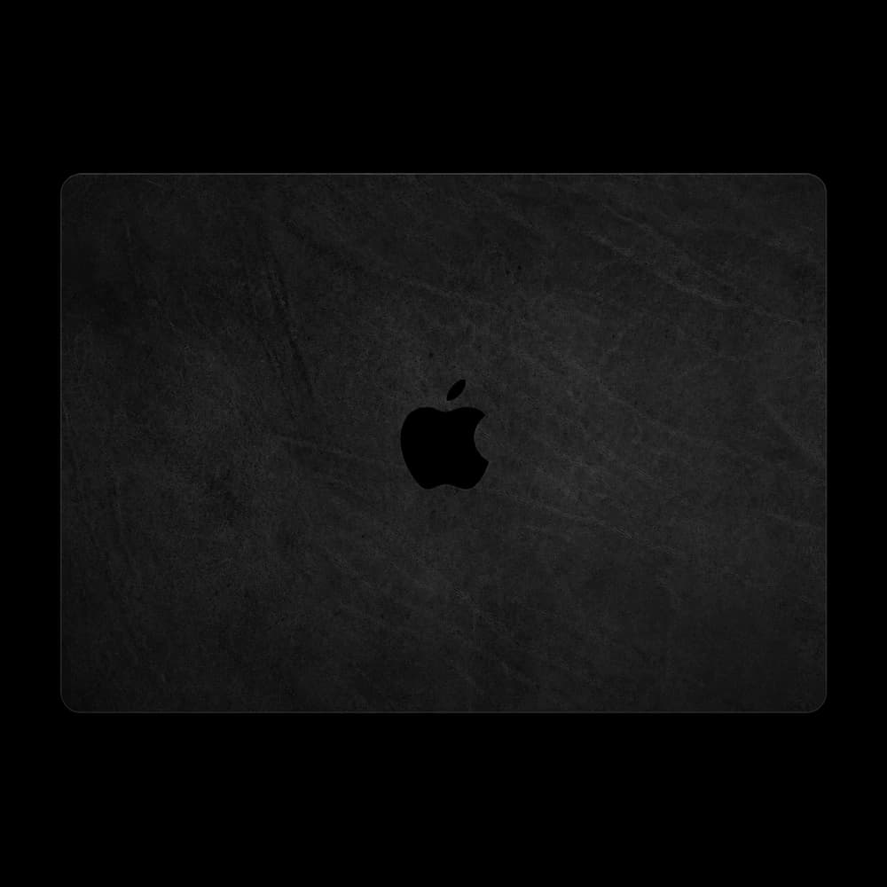 MacBook Pro lid covered in dbrand black leather